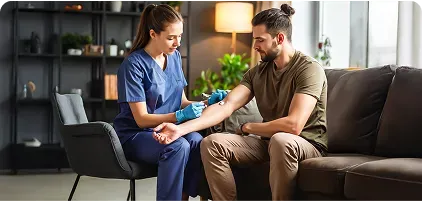 Nurse checking a patient at home