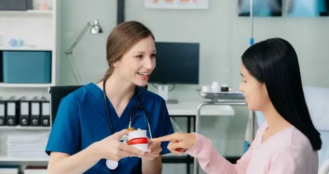 Nurse discussing a care plan with a family member