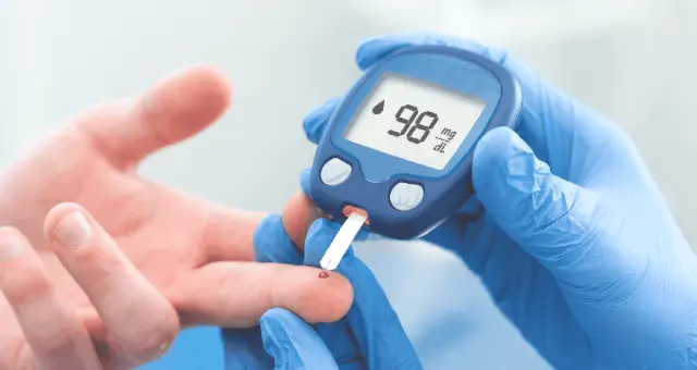 Finger-prick blood sugar check with a glucose meter